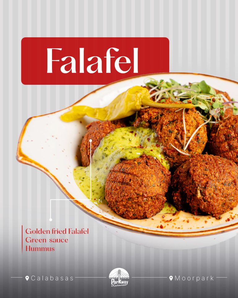 A colorful platter of crispy golden falafel served with smooth hummus and fresh pita bread, representing the high quality of mediterranean food los angeles.